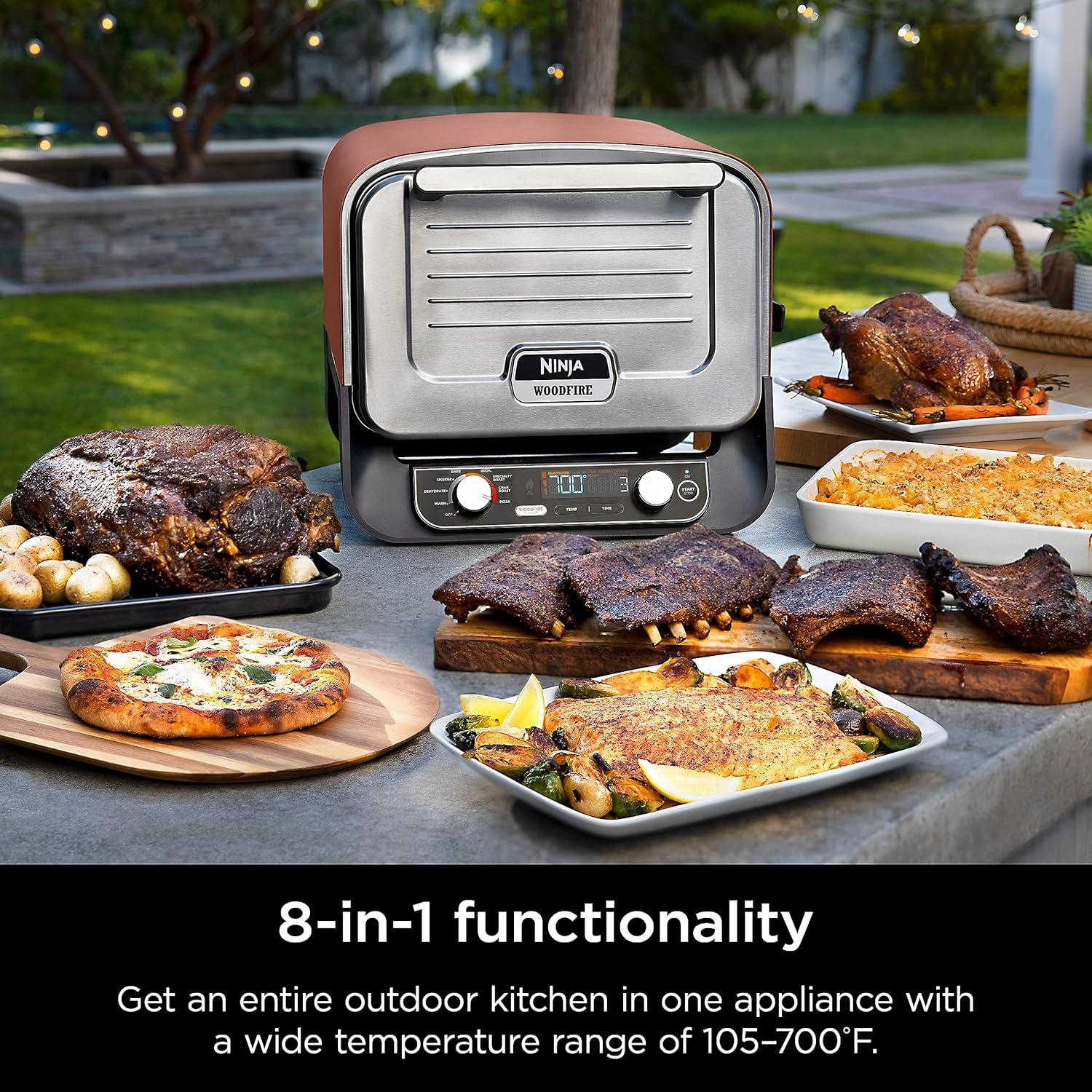 imageNinja Woodfire Outdoor Pizza Oven 8in1 Portable Electric Roaster Oven Heats up to 700F 5 Artisan Pizza Settings Integrated BBQ Smoker Box Includes Flavored Wood Pellets Terracotta RedPizza Oven Smoker