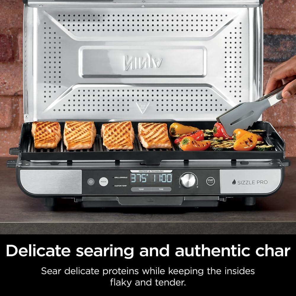 imageNinja Sizzle Pro XL 20Inch Indoor Griddle Grill Detachable Ventilated Lid Grease Control Ceramic Nonstick Plates Even EdgetoEdge Cooking XL Capacity Versatile Silver GX101 Renewed
