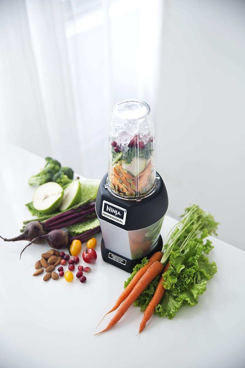 imageNinja Nutri Pro Compact Personal Blender with 18 Oz and 24 Oz To Go Cups in a Black and Silver Finish